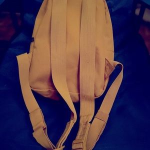 Mini Herschel backpack | mustard yellow | gently used | in good condition